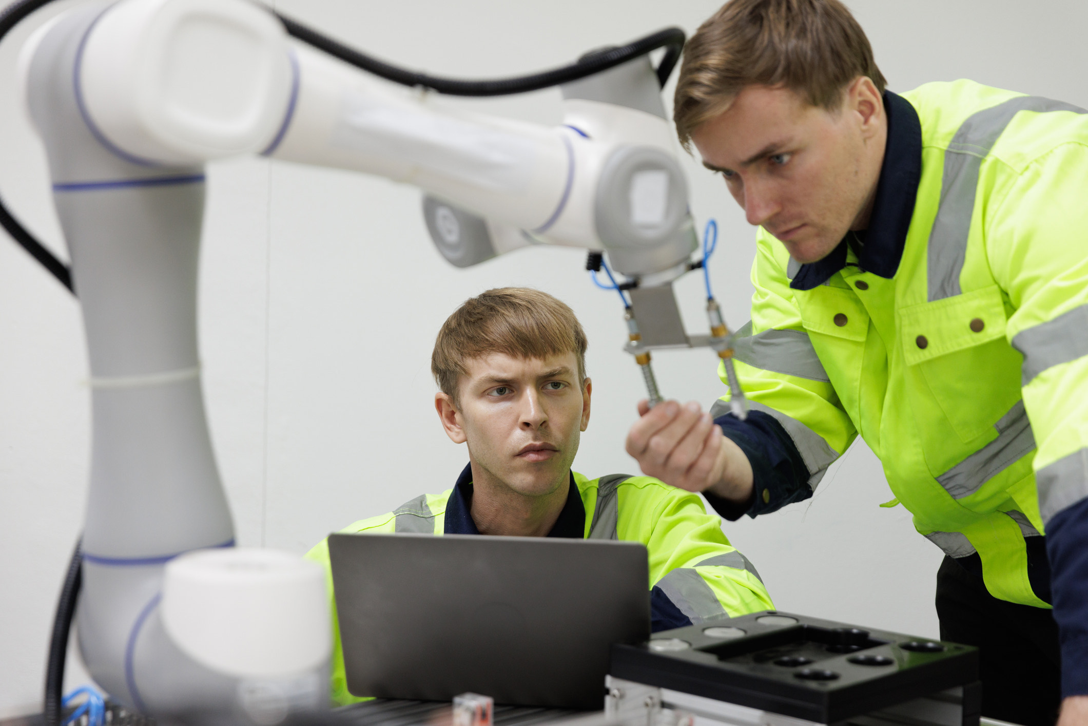 engineers build robotic arm