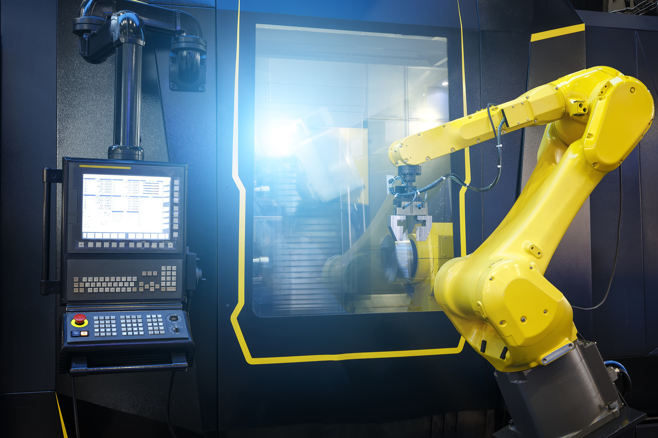 photo-of-robotic-arm-managing-parts-for-cnc-machine